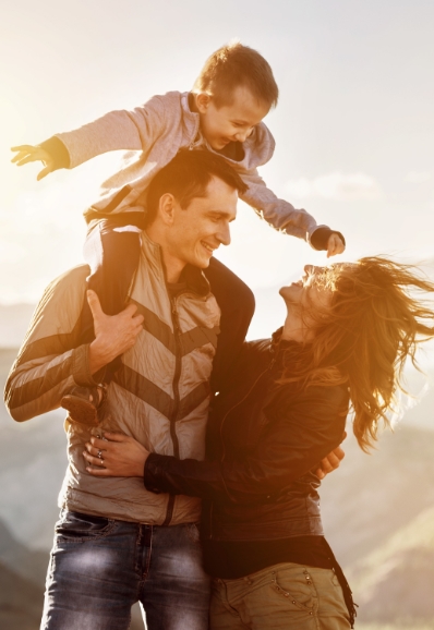 Parents and kid enjoying Invermere sunset