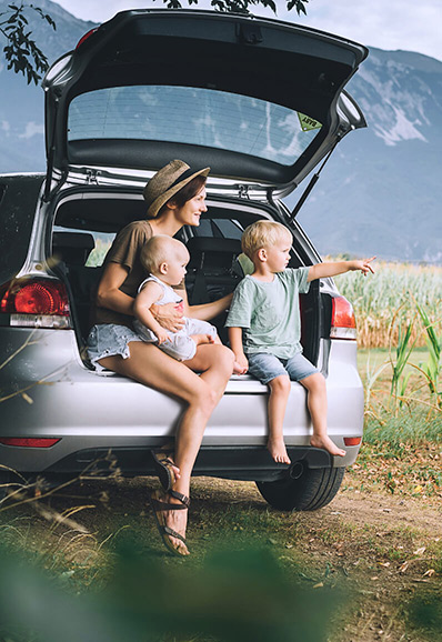 Mother with her two kids on a road trip in the Invermere area
