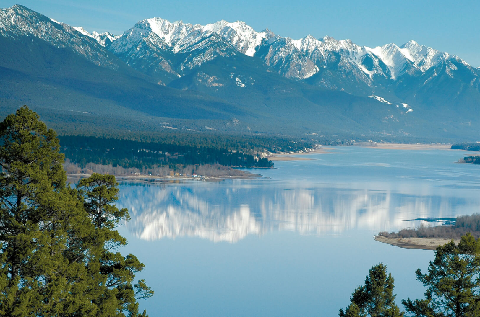 Scenic view of Lake Windermere with surrounding mountains